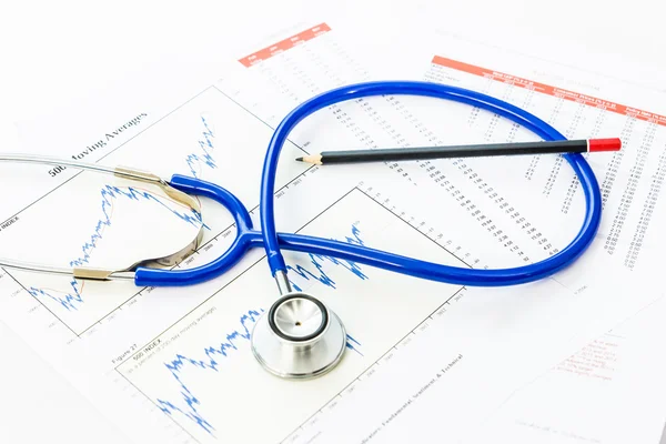 Stethoscope with financial graph — Stock Photo, Image