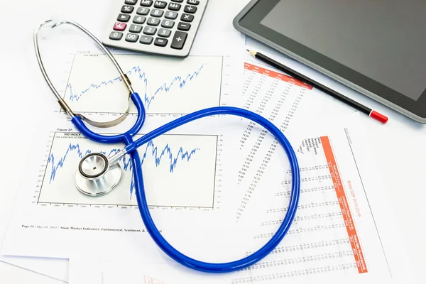 Stethoscope with financial graph — Stock Photo, Image