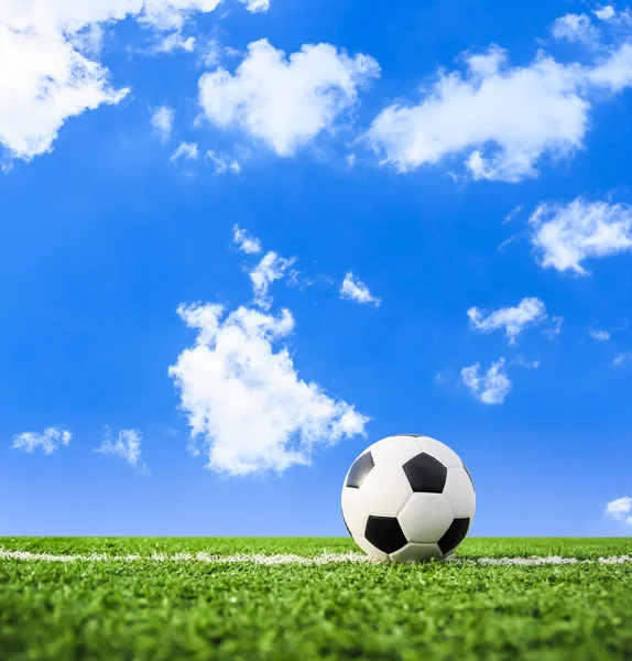 Football on green grass — Stock Photo, Image