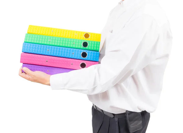Człowiek biznesu gospodarstwa stos kolorowy folder — Zdjęcie stockowe