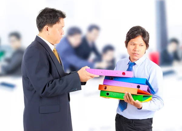 Business man giving jobs to worker — Stock Photo, Image