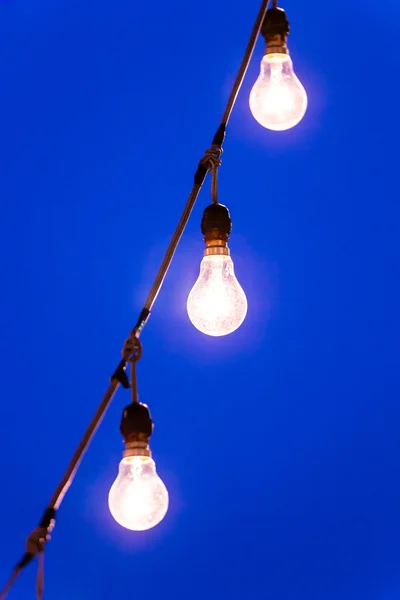 Light bulb at dusk — Stock Photo, Image