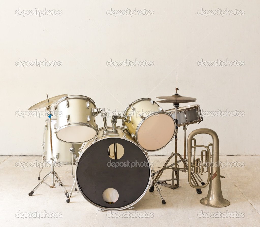 set of drums in white room