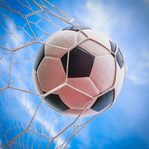 Ball in goal net — Stock Photo, Image