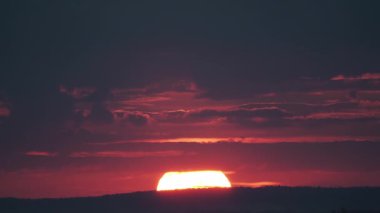 Big sun with clouds. Timelapse