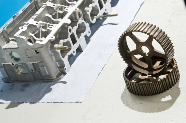 The block of cylinders from the engine of a sports car on a work — Stock Photo, Image