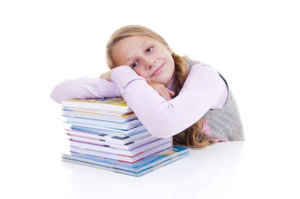Schoolgirl with the pile of new books — Stock Photo, Image