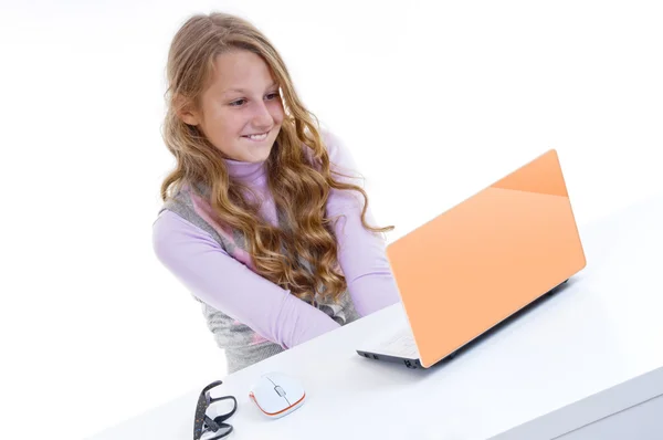 Schoolgirl with her white netbook — Stock Photo, Image