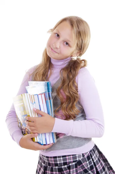 Gadis sekolah dengan tumpukan buku-buku baru — Stok Foto