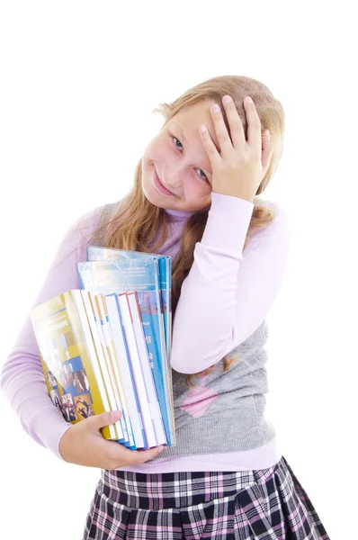 Gadis sekolah dengan tumpukan buku-buku baru — Stok Foto