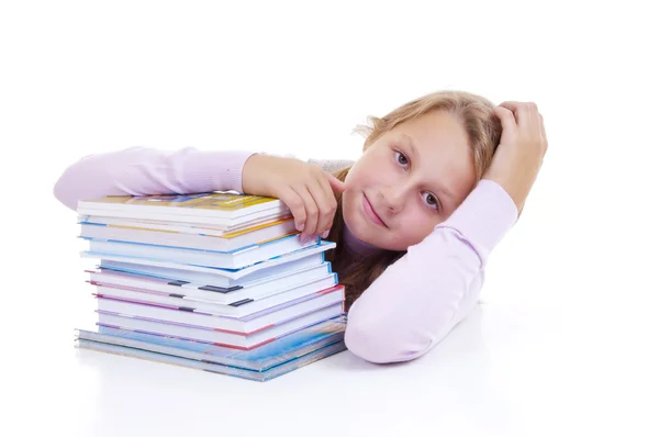 Schoolgirl with the pile of new books — Stock Photo, Image