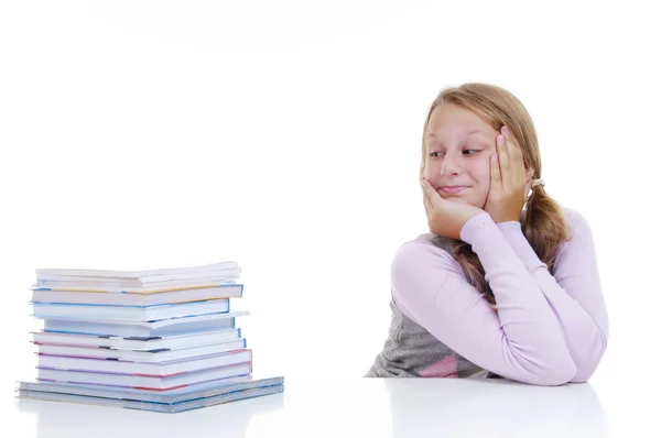 Schoolgirl with the pile of new books — Stock Photo, Image