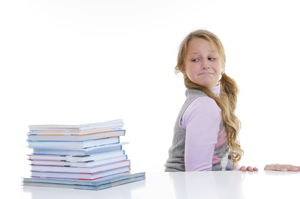 Schoolgirl with the pile of new books — Stock Photo, Image