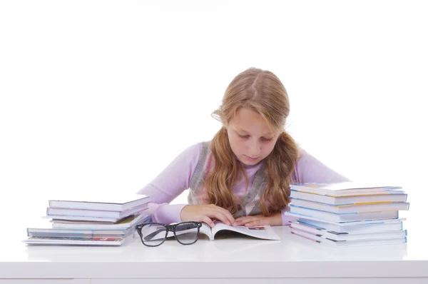 Schoolgirl with the pile of new books — Stock Photo, Image