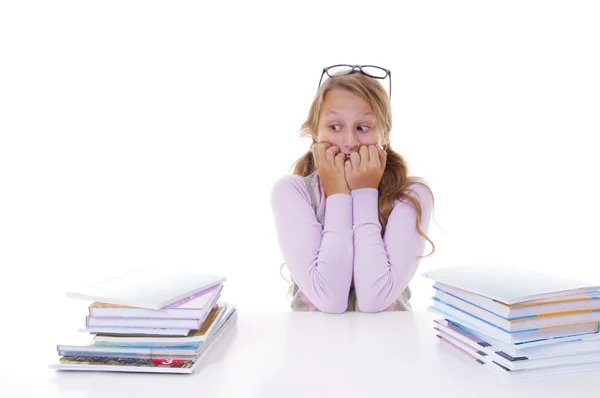 Schoolgirl with the pile of new books — Stock Photo, Image