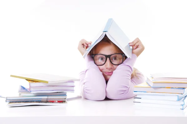 Schoolgirl with the pile of new books — Stock Photo, Image