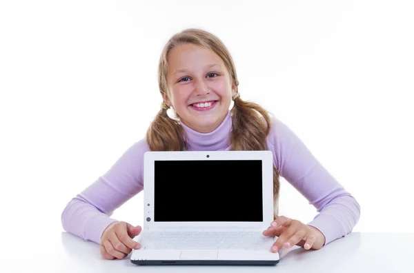 Schoolgirl with her white netbook Stock Picture