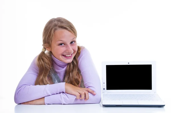 Schoolgirl with her white netbook Stock Image