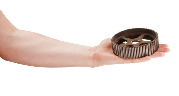 Old camshaft pulley in the man hand — Stock Photo, Image