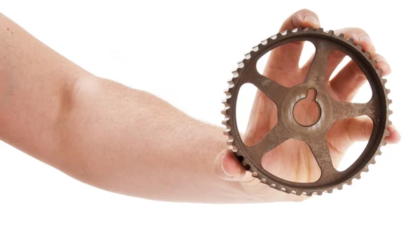 Old camshaft pulley in the man hand — Stock Photo, Image