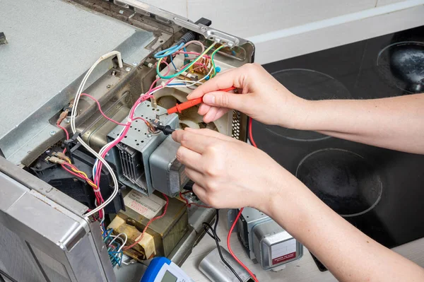 Repair Microwave Oven Woman Measures Electrical Characteristics Tester — Stock Photo, Image