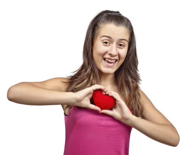 Dziewczyna trzyma czerwone serce — Zdjęcie stockowe