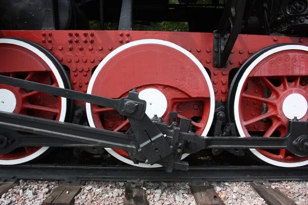 Red wheels of railway trains. — Stock Photo, Image