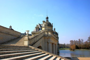 Small Chantilly castle on the outskirts of Paris. France. clipart