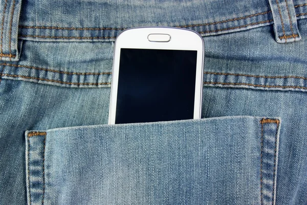 Weißes Telefon in der Tasche — Stockfoto