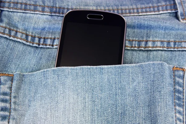 Schwarzes Telefon in der Tasche — Stockfoto