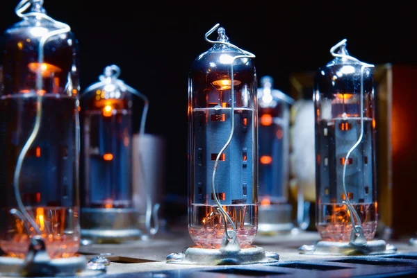 Glowing vacuum electron tubes Stock Photo