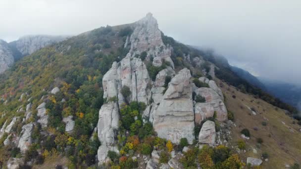 Aerial Footage Mountains Rocky Sculptures Getting Covered Clouds High Quality — Vídeo de stock
