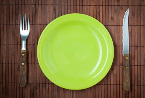 Lege diner plaat, mes en vork. — Stockfoto