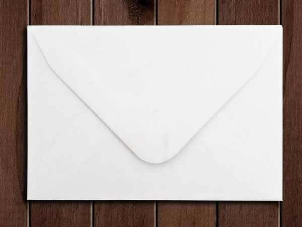 White Envelope Wooden Surface — Zdjęcie stockowe