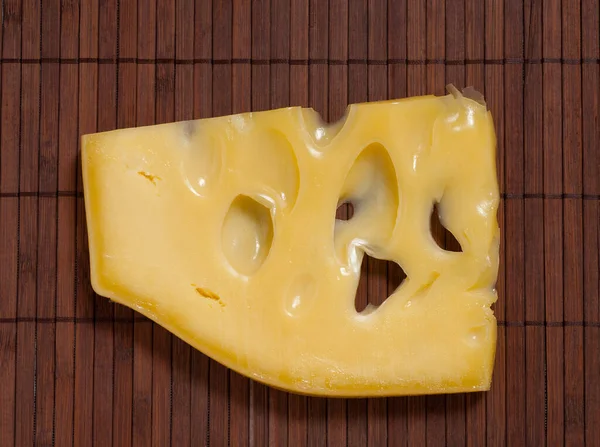 Piece Swiss Cheese Table Stockbild