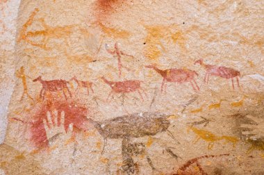 Ancient hunting scene painted in a cave in Patagonia, Southern Argentina.