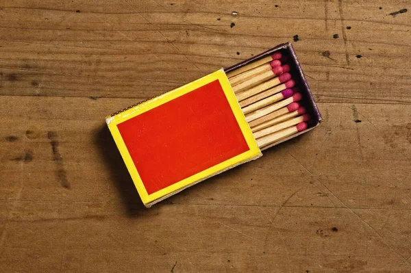 Red Matchbox Old Wooden Table — Stockfoto