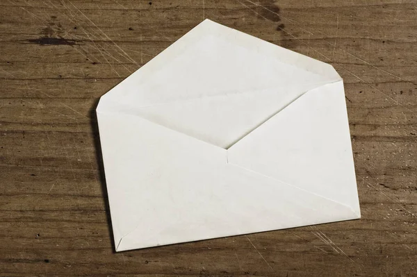 White Envelope Wooden Table Open Studio Shot — Stock Photo, Image