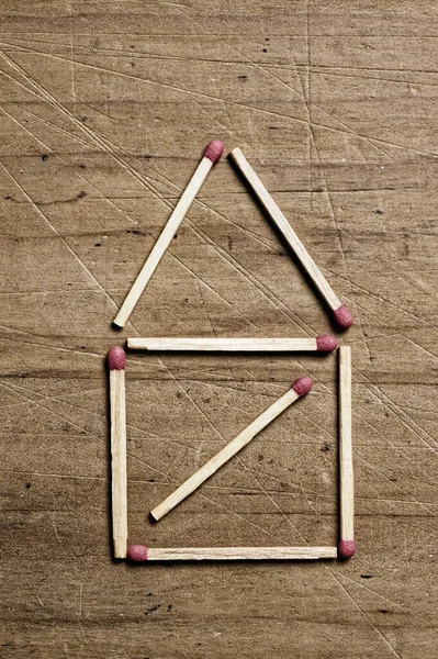 Matches Wooden Surface Forming House Shape — 스톡 사진
