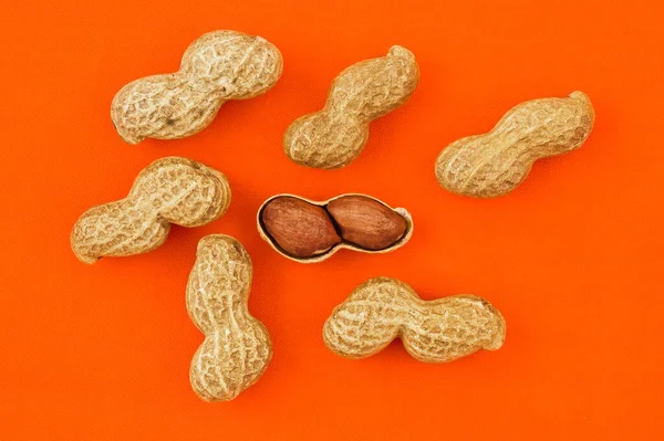 Amendoins Fundo Laranja Close Shot — Fotografia de Stock