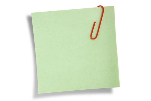 Зелена Нотатка Залишку Ізольована Білому Тлі Червоним Кліпом — стокове фото