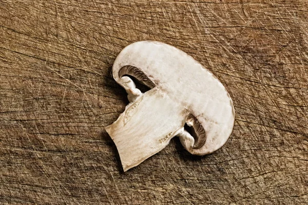 Champignon Slice Agaricus Bisporus Cultivated Mushroom Closeup Wooden Table — 图库照片