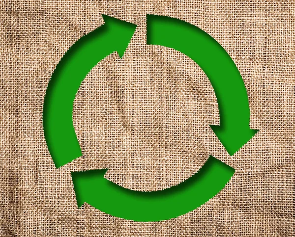 Grobe Alte Leinwand Mit Grünem Recyclingschild lizenzfreie Stockfotos