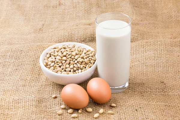 Soybean milk one glass and eggs — Stock Photo, Image