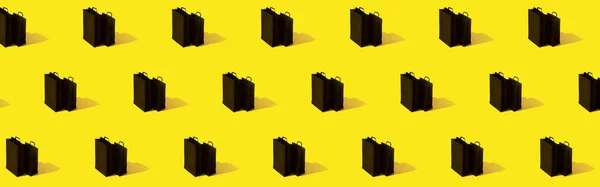 Kreativní Vzor Černými Nákupních Tašek Prodej Žlutém Pozadí Banner Formát — Stock fotografie