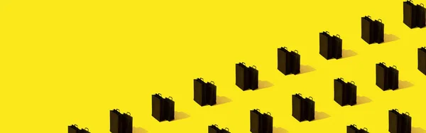 Kreativní Vzor Černými Nákupních Tašek Prodej Žlutém Pozadí Banner Formát — Stock fotografie
