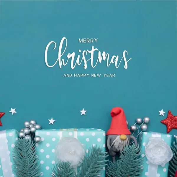 Joyeux Noël carte de vœux avec des décorations plates vacances d'hiver sur fond turquoise — Photo