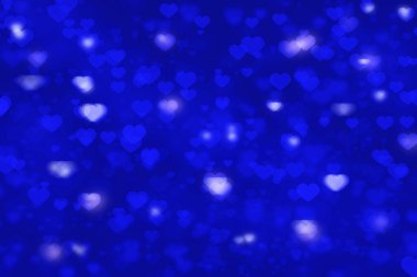 Heart shape bokeh blue background for valentine's day greeting card or wallpaper