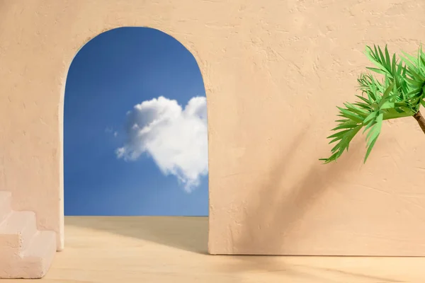 Paper palm tree on the background of concrete wall with arch and blue sky view and stairs. Abstract interior summer background or scene for the product.