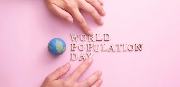 World Population Day Write Wooden Letter Globe Woman Hands — Stock Photo, Image